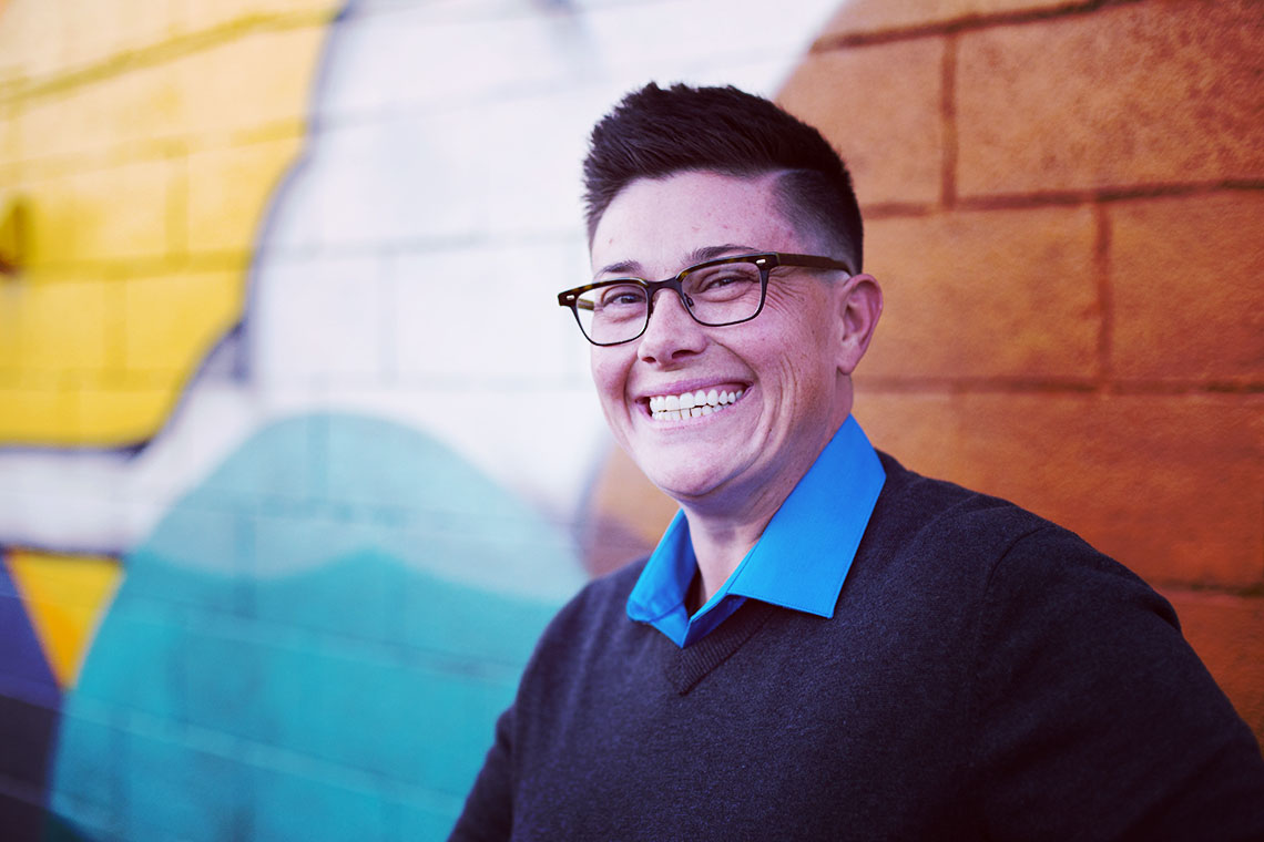 LGBTQ therapist Asher Eno smiling in Denver